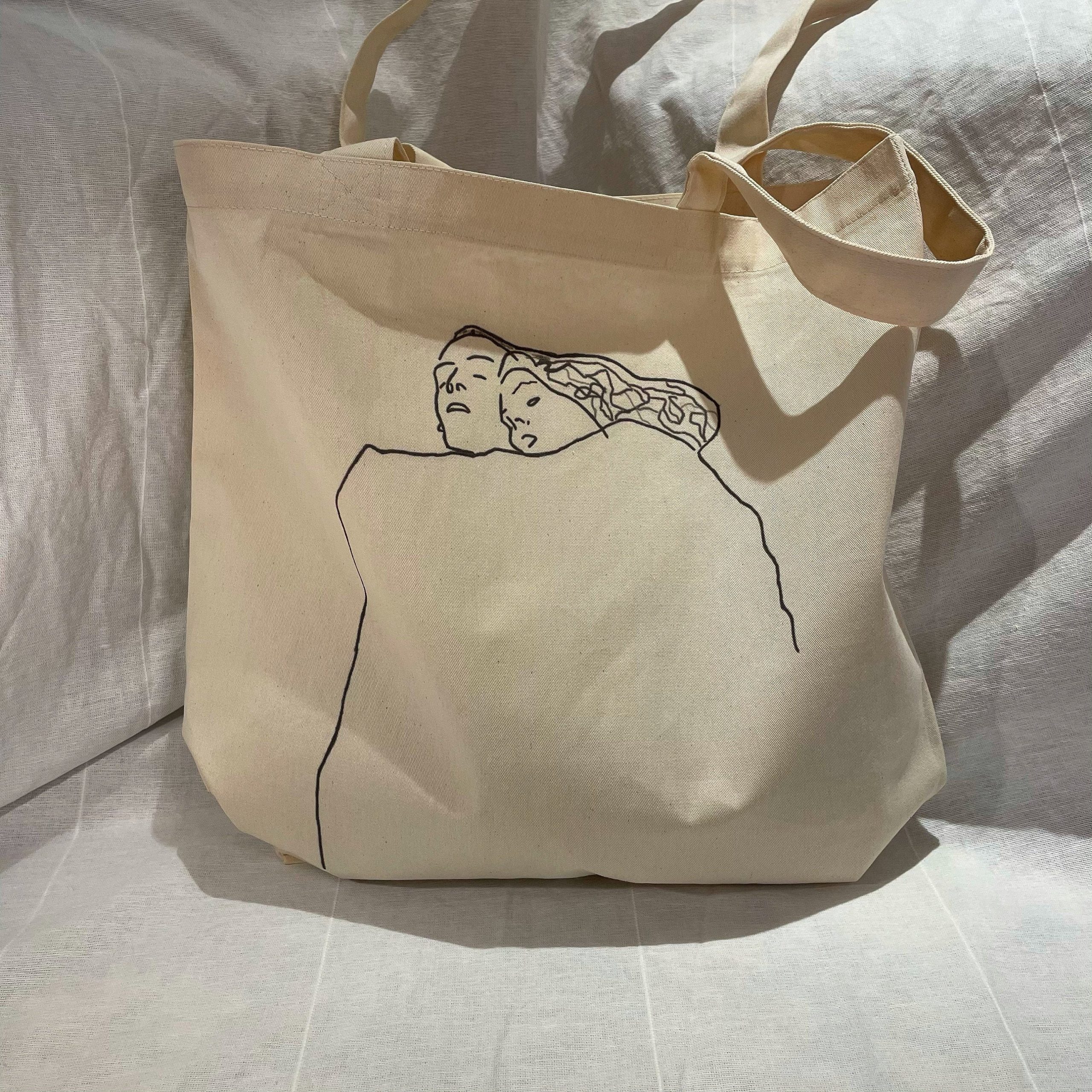 Sleeping Couple Tote Bag